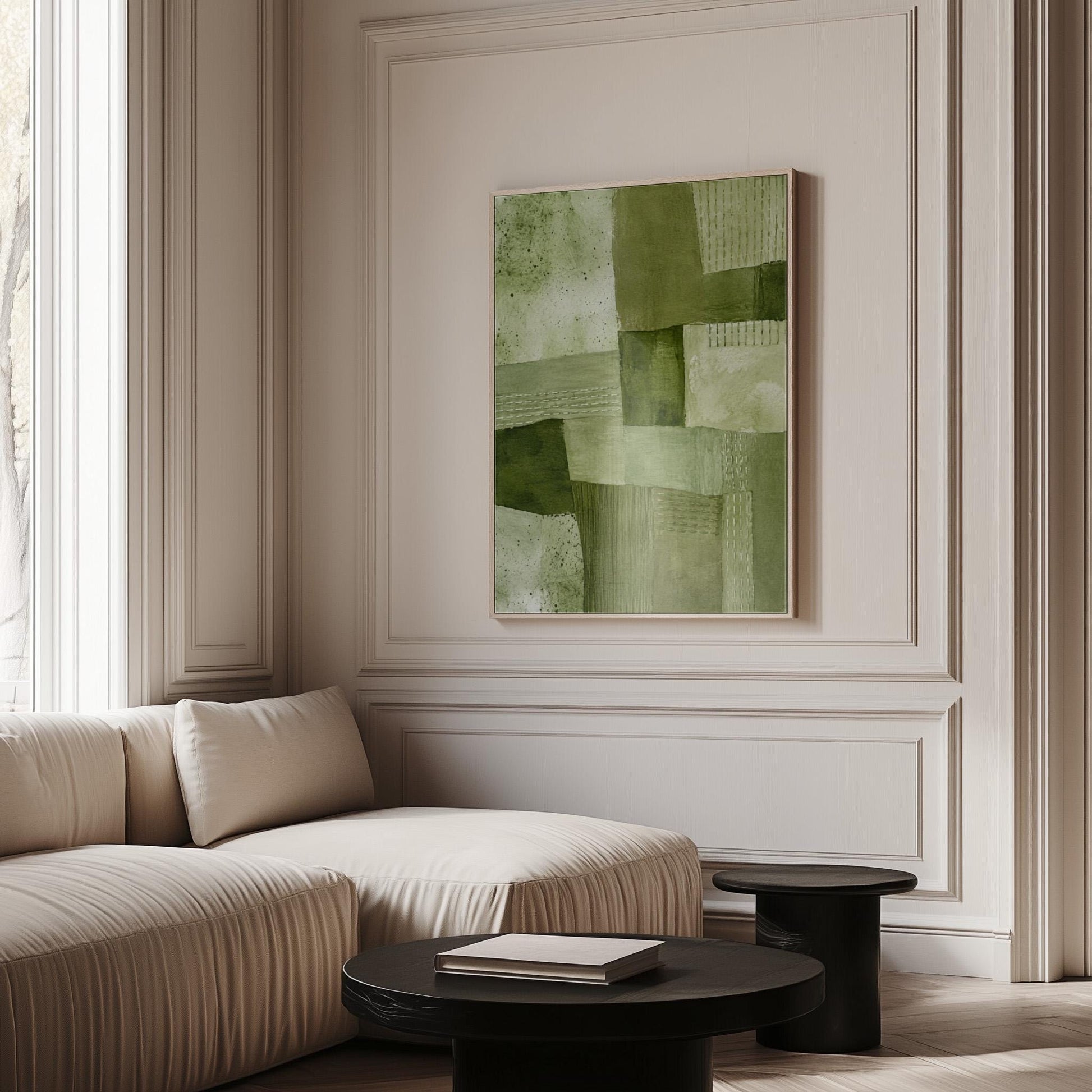 Patchwork of olive and moss green field blocks, canvas wall art presented in a light, minimal room