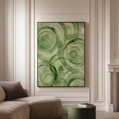 Concentric ripple rings in soft watercolor greens, canvas print on a softly lit wall in a calm interior