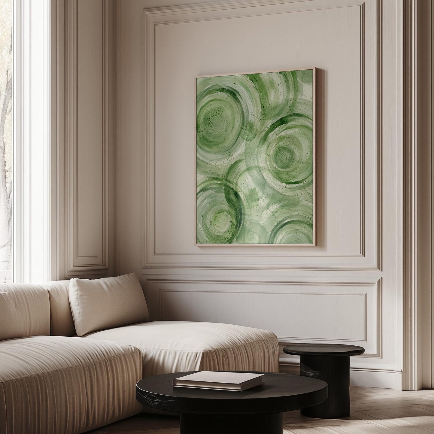 Concentric ripple rings in soft watercolor greens, canvas wall art styled against a soft white wall