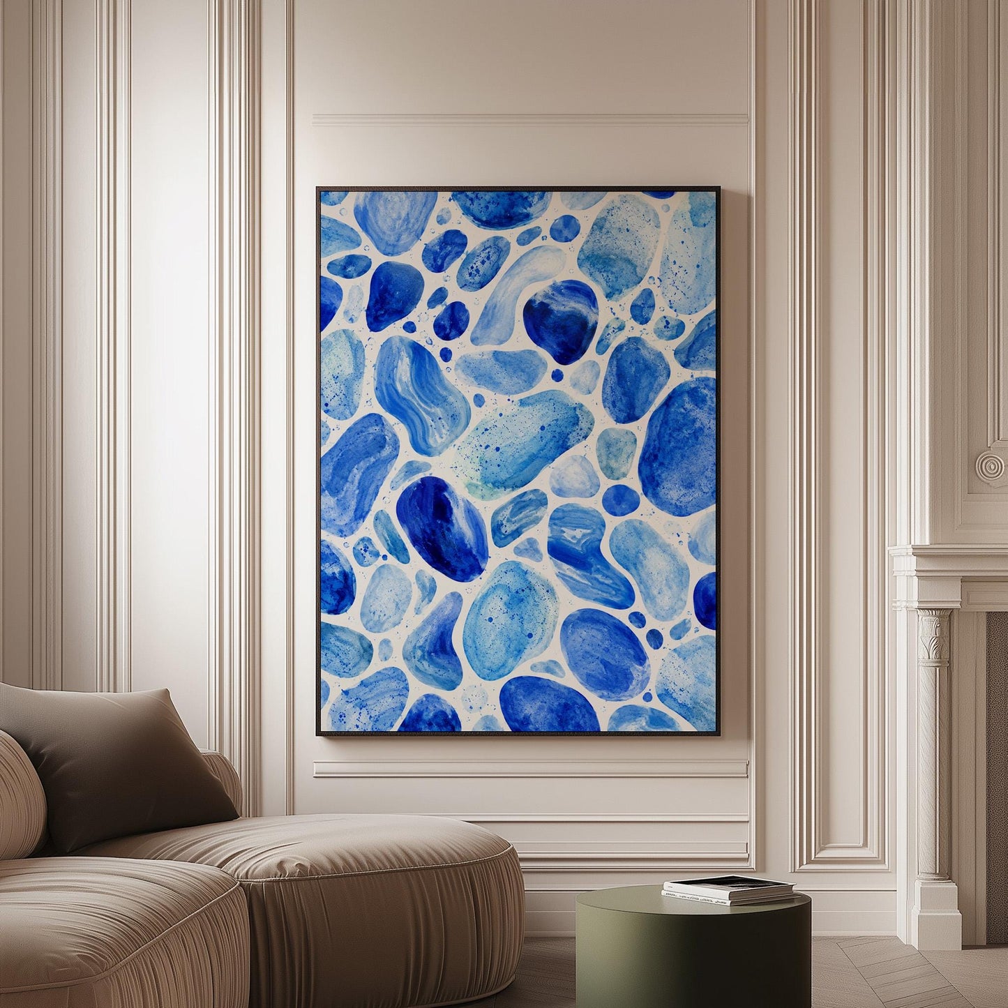 Watercolor pebbles in shades of sky blue and cobalt, canvas print on a softly lit wall in a calm interior