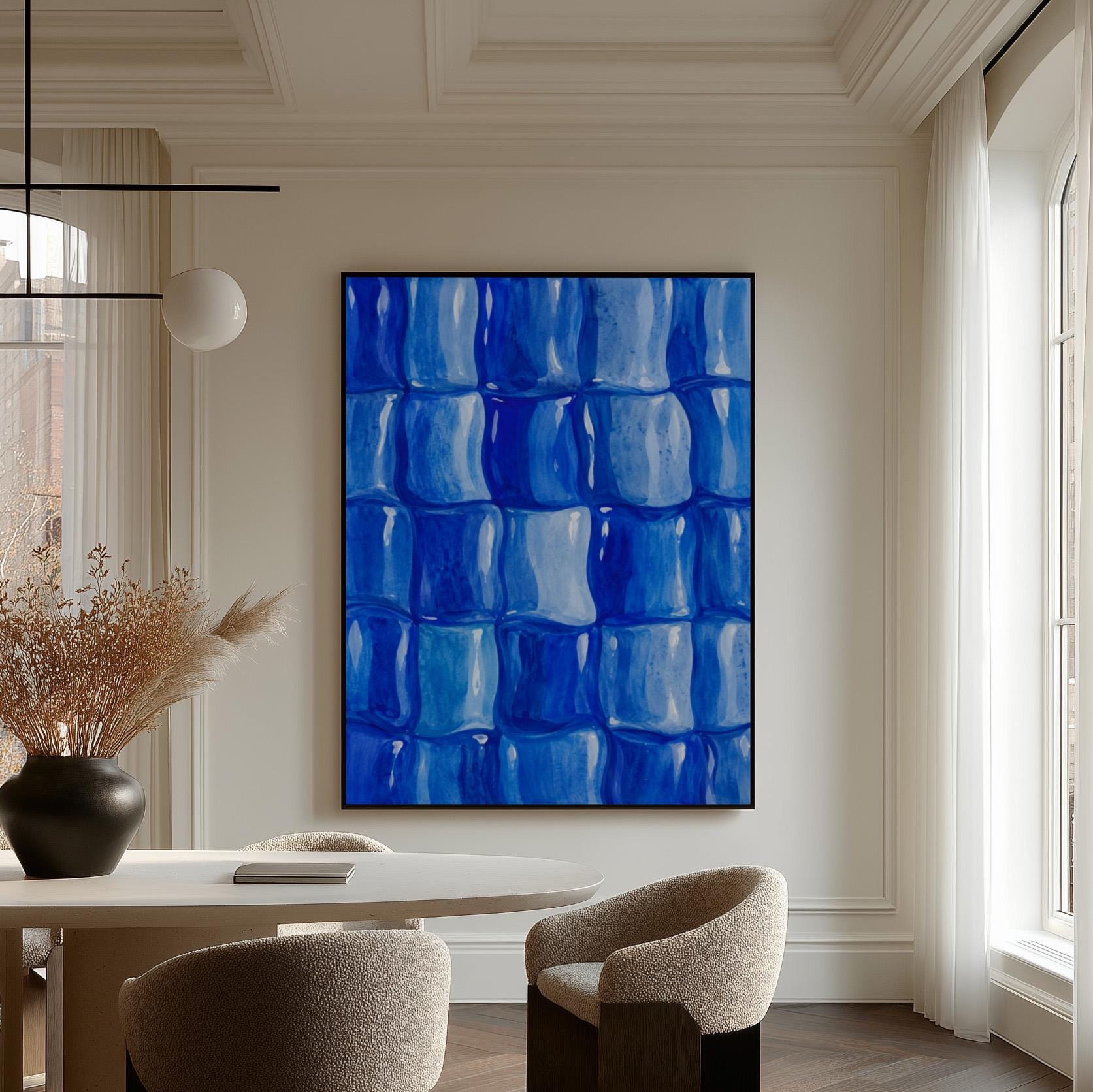 Grid of rounded squares in layered cobalt blues, canvas wall art on a quiet wall in a considered interior
