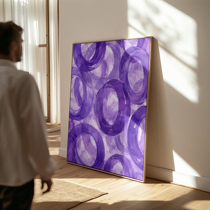 Swirling amethyst purple rings on pale background, canvas wall art on a quiet wall in a considered interior