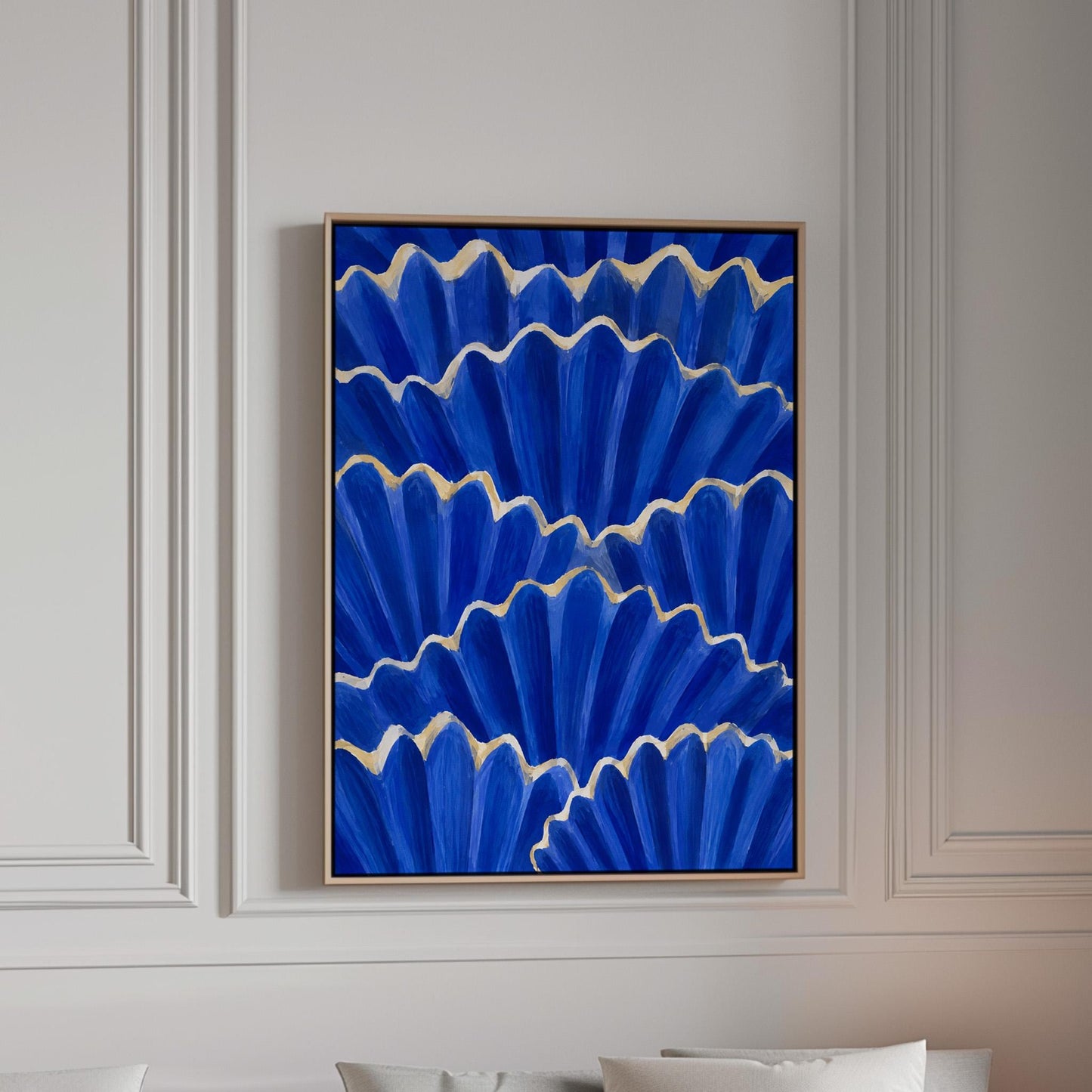 Fan shaped scallop shells in cobalt with gold edges, canvas print in a bright room with natural daylight