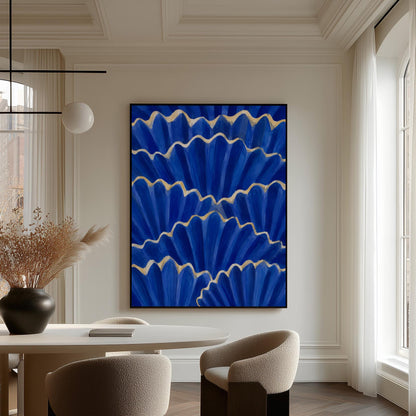 Fan shaped scallop shells in cobalt with gold edges, canvas wall art styled against a soft white wall