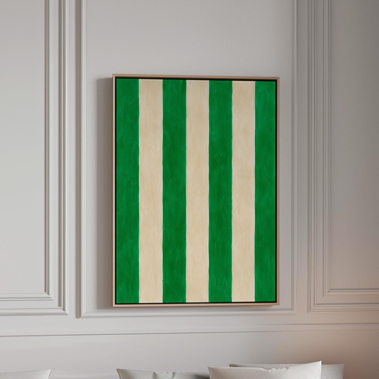 Bold vertical cabana stripes in emerald green and cream, canvas print in a bright room with natural daylight