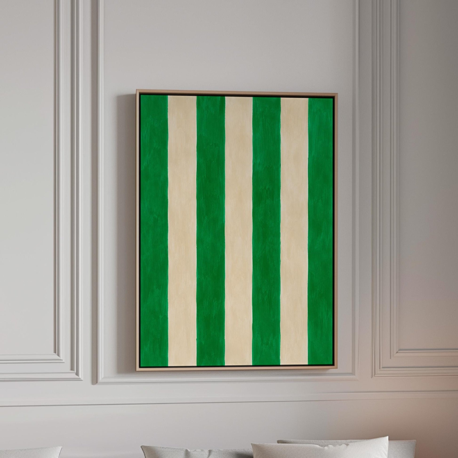 Bold vertical cabana stripes in emerald green and cream, canvas print in a bright room with natural daylight