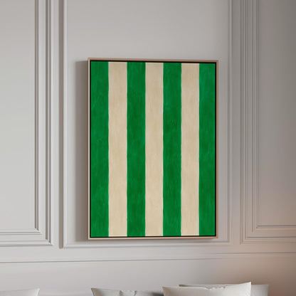 Bold vertical cabana stripes in emerald green and cream, canvas print in a bright room with natural daylight