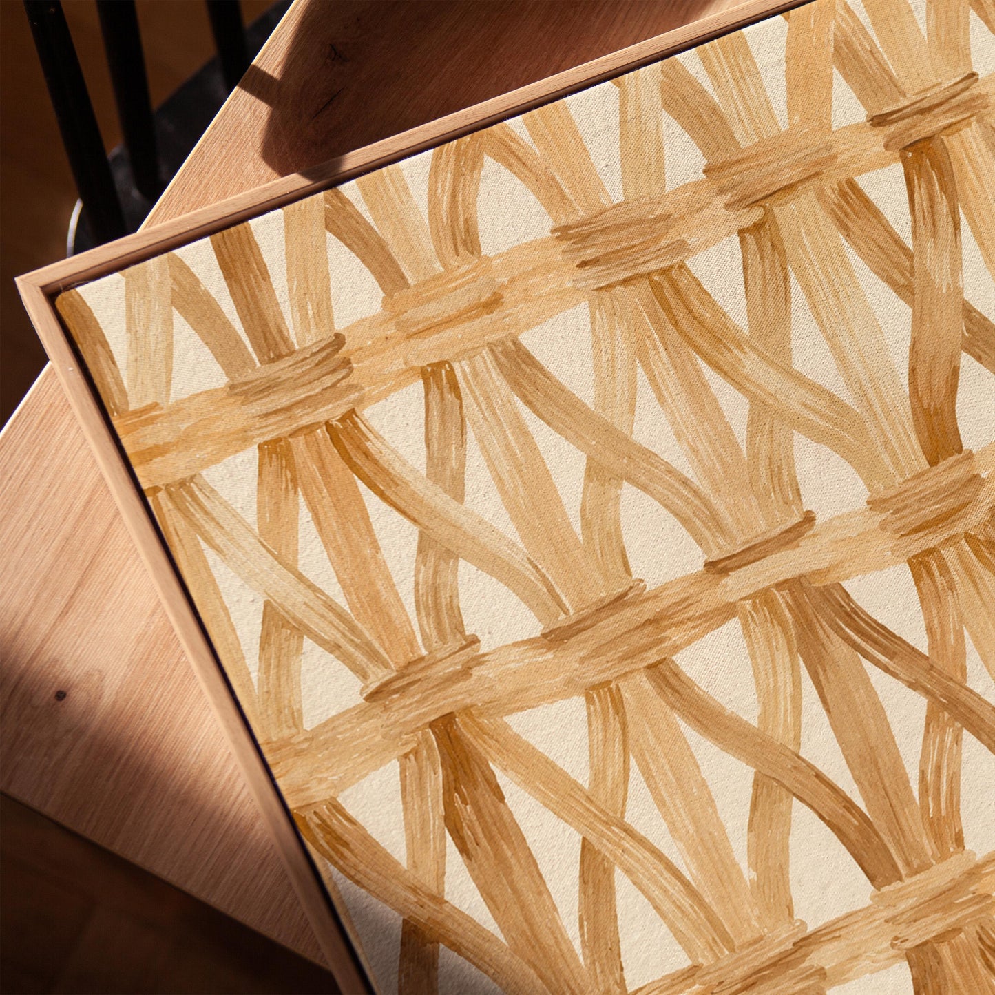 Interwoven rattan lattice pattern in honey beige, canvas print in a warm, minimally styled interior