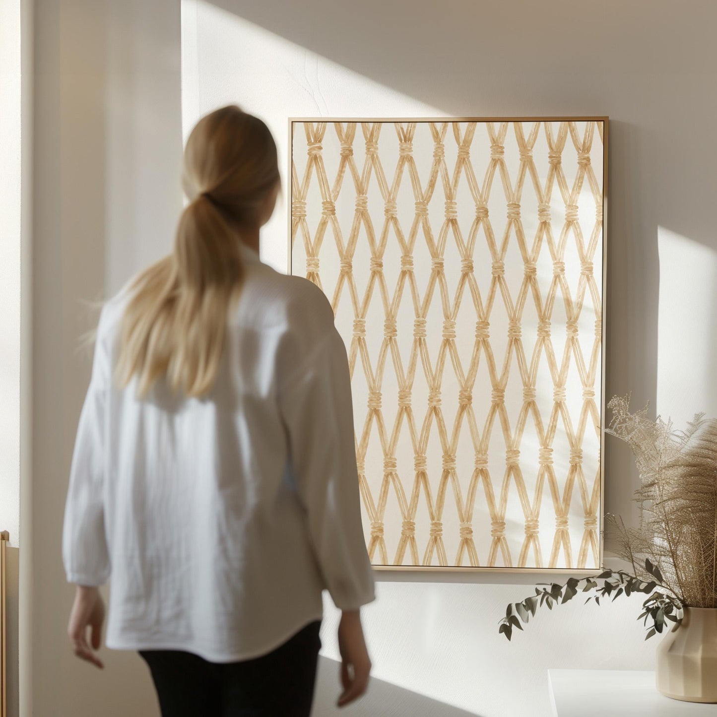 Diamond trellis of natural bands on cream background, canvas print hanging in a calm, modern living space
