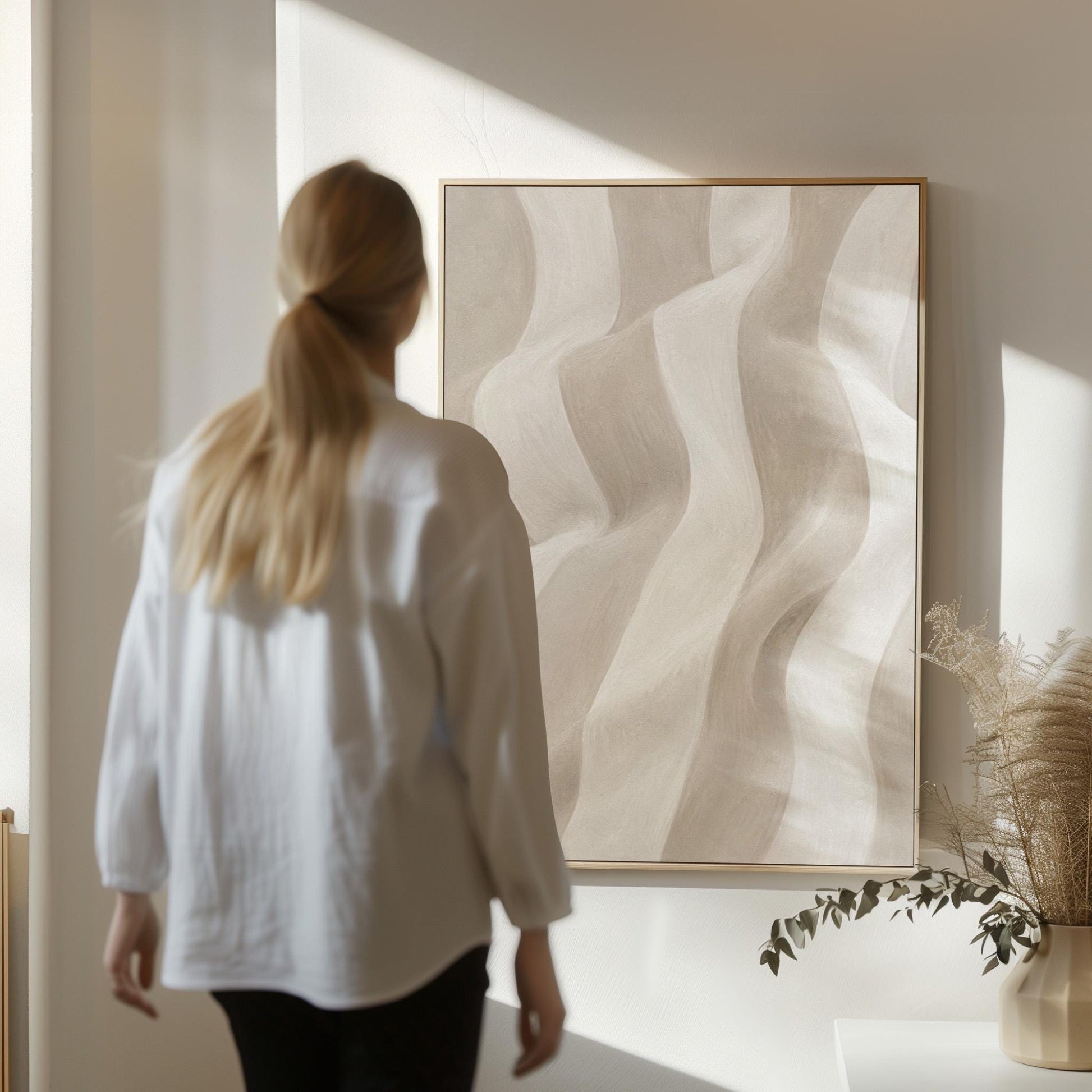 Soft draped wave folds in ivory and warm white, canvas print shown to scale in a furnished room