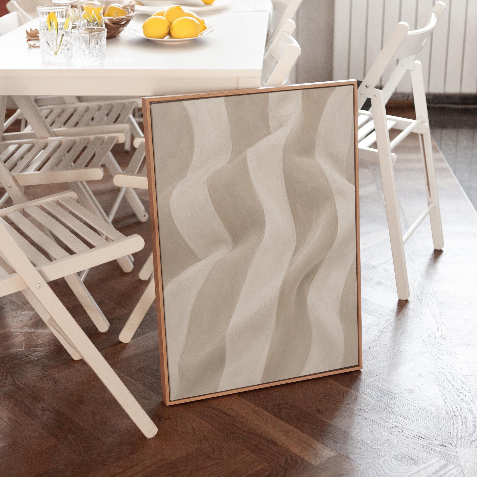 Soft draped wave folds in ivory and warm white, canvas print on a quiet wall in a considered interior