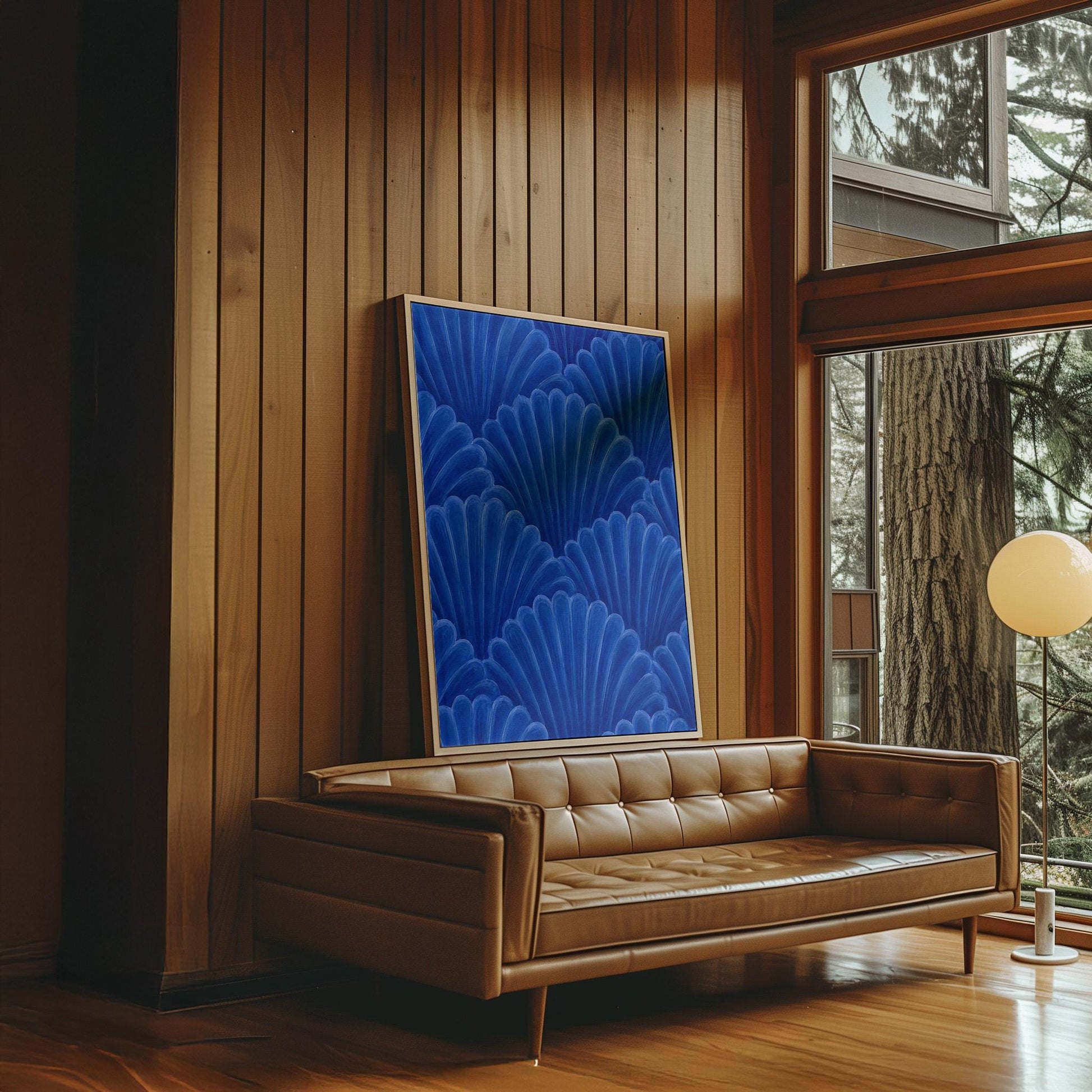 Fan shaped shell scales pattern in sapphire blue, canvas print styled against a soft white wall