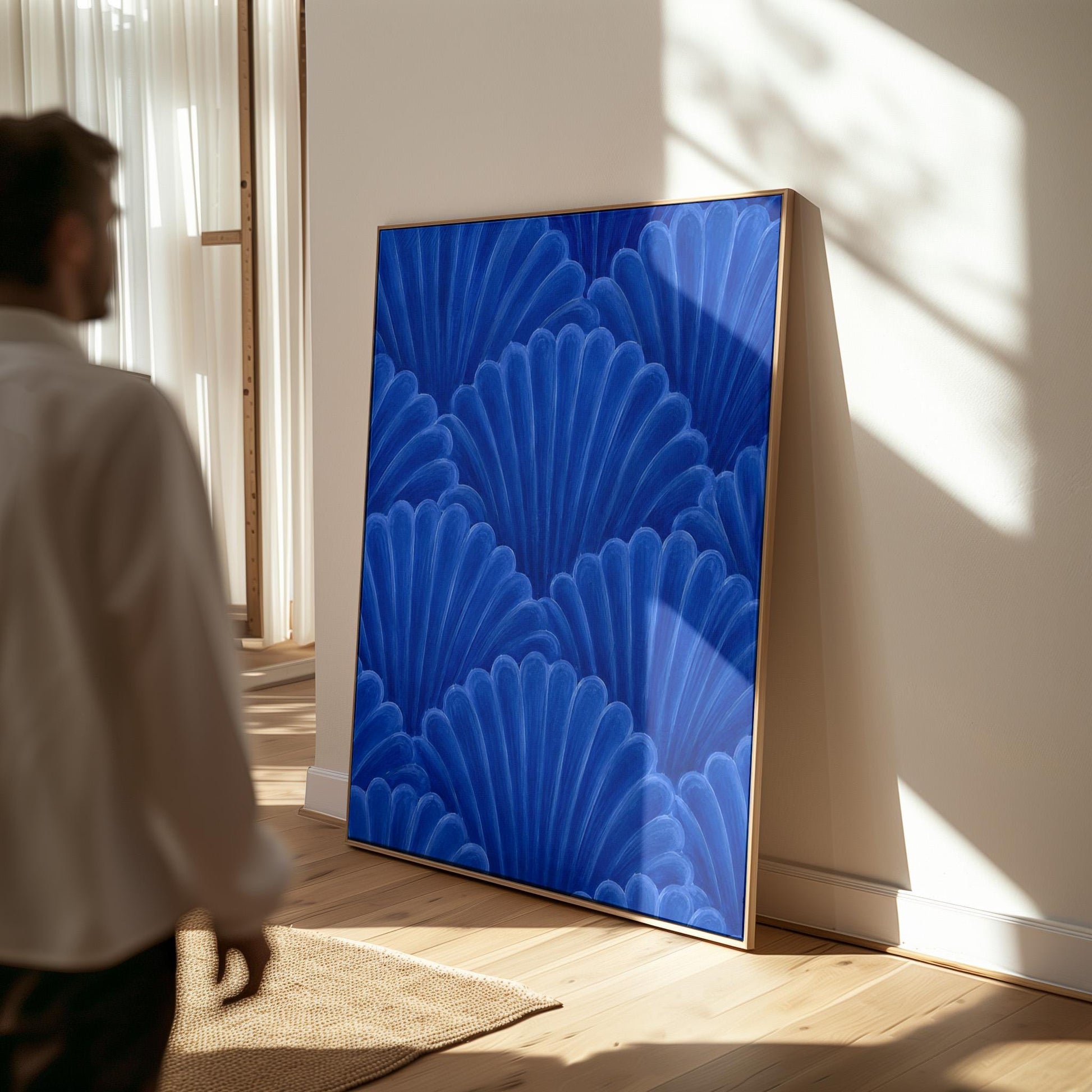 Fan shaped shell scales pattern in sapphire blue, canvas print seen in a warm interior with natural light