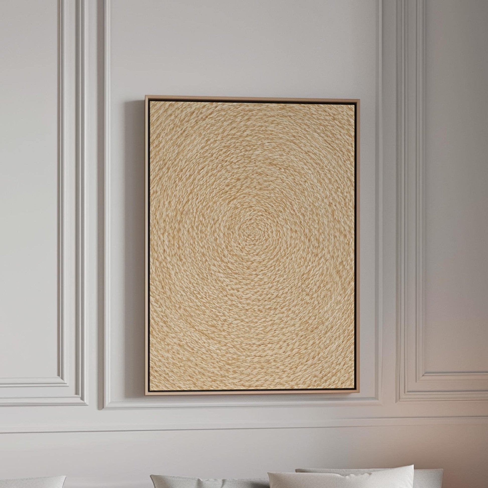 Spiral coiled circle pattern in wheat and straw gold, canvas print in a bright room with natural daylight