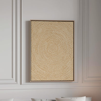 Spiral coiled circle pattern in wheat and straw gold, canvas print in a bright room with natural daylight