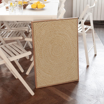 Spiral coiled circle pattern in wheat and straw gold, canvas print shown to scale in a furnished room