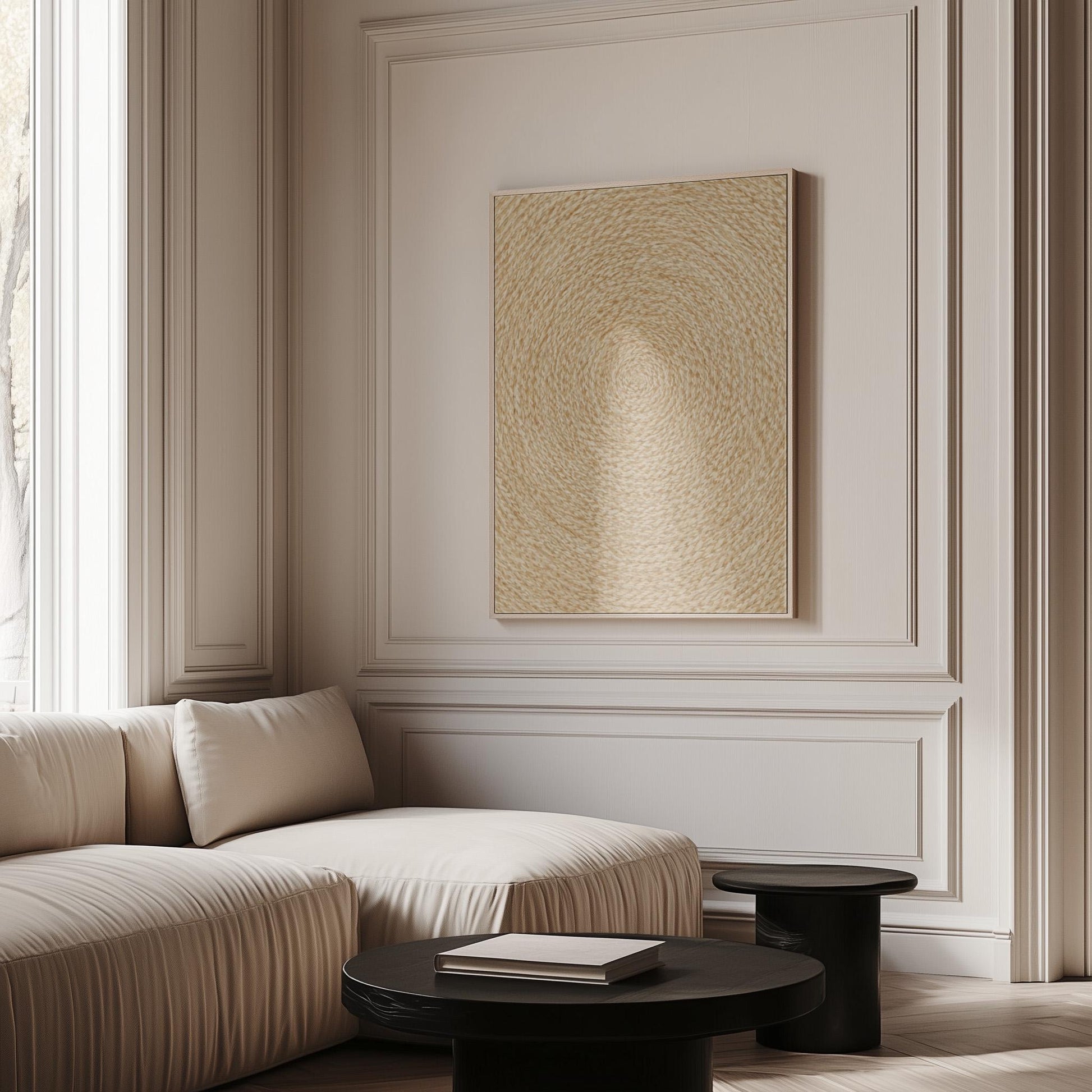 Spiral coiled circle pattern in wheat and straw gold, canvas wall art on a quiet wall in a considered interior