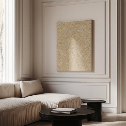 Spiral coiled circle pattern in wheat and straw gold, canvas wall art on a quiet wall in a considered interior