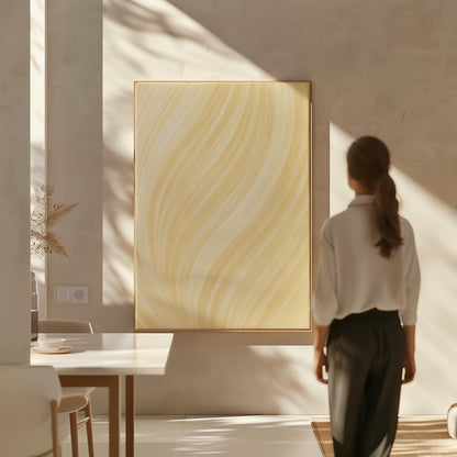 Flowing honey gold waves with soft warm glow, canvas print displayed on a neutral wall in a styled interior