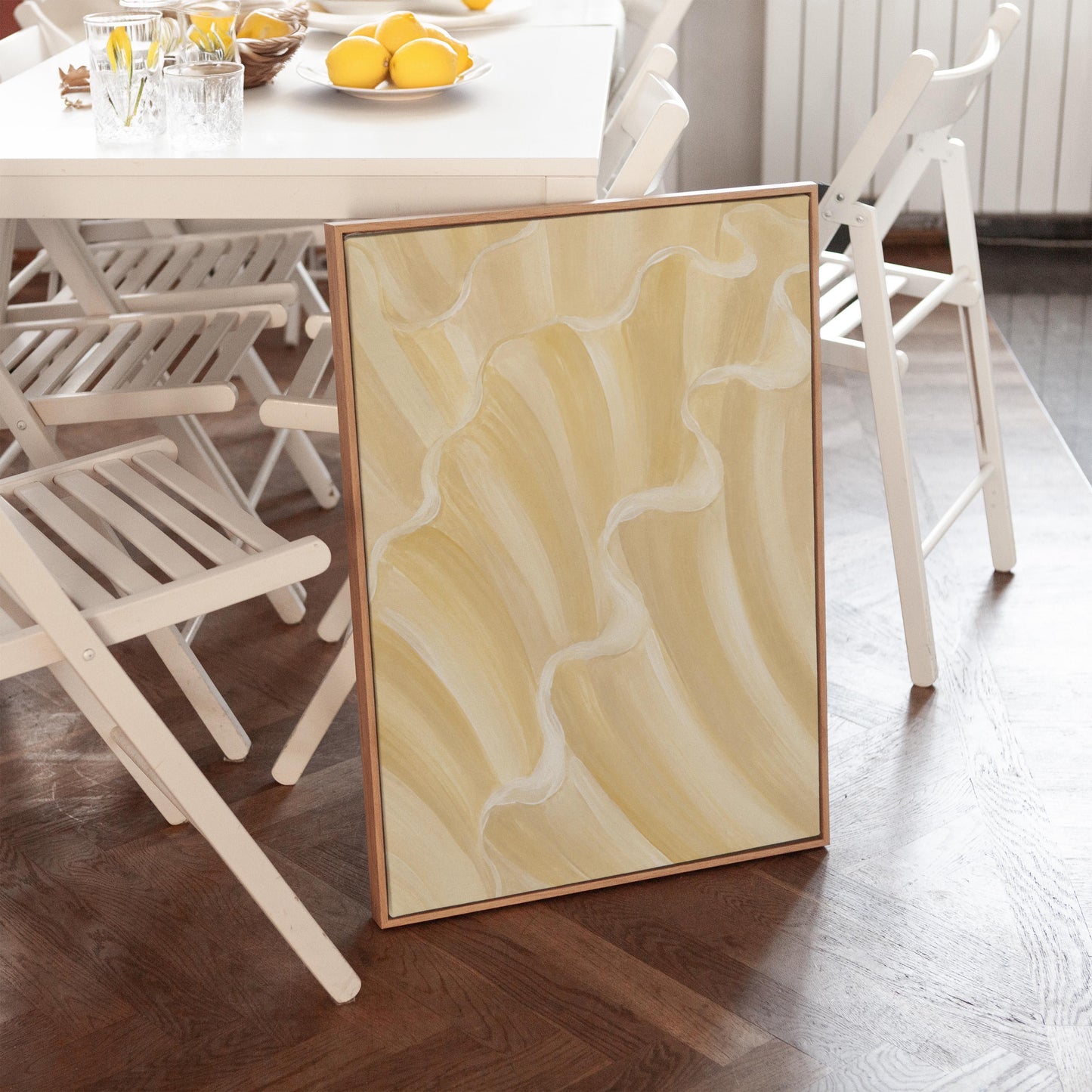 Ruffled wave folds in champagne cream and gold, canvas print on a quiet wall in a considered interior