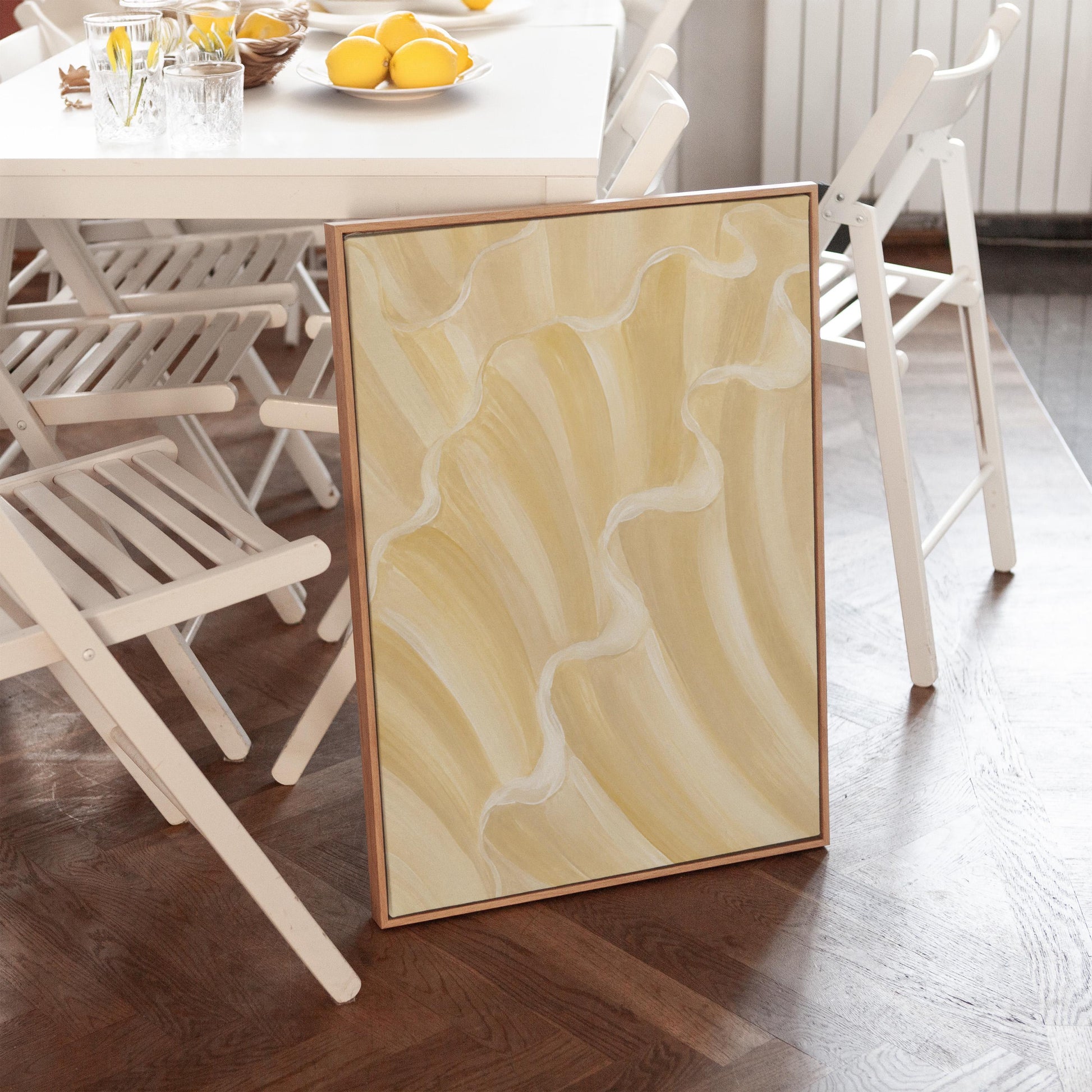 Ruffled wave folds in champagne cream and gold, canvas print on a quiet wall in a considered interior