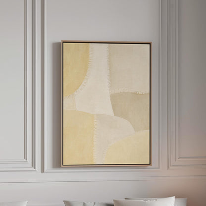 Soft tonal beige blocks joined by delicate stitch lines, canvas print in a bright room with natural daylight