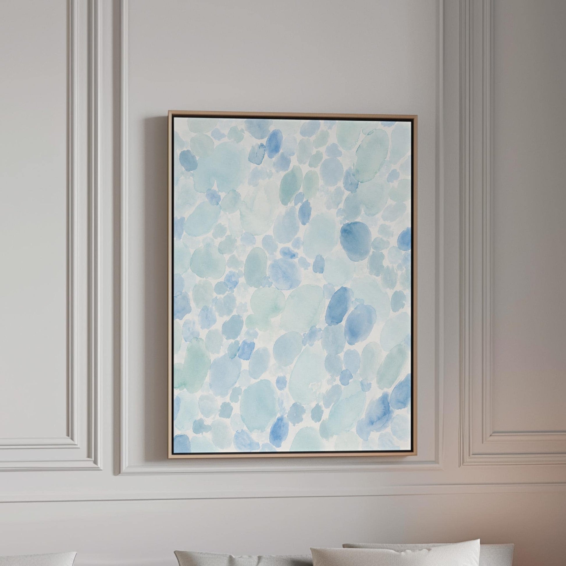 Dappled watercolor petals in light baby blue, canvas print in a bright room with natural daylight