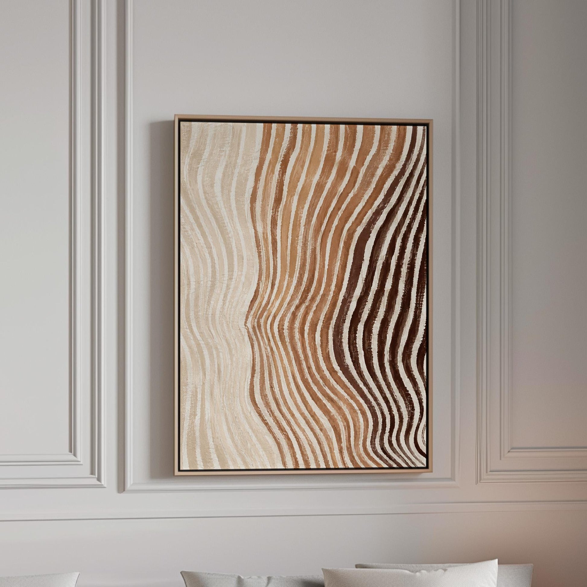 Rippling contour lines in cocoa brown and cream, canvas print in a bright room with natural daylight
