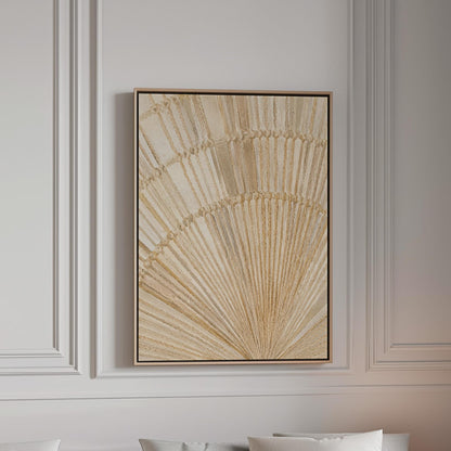 Golden fan palm leaf with radiating rays on cream, canvas print in a bright room with natural daylight