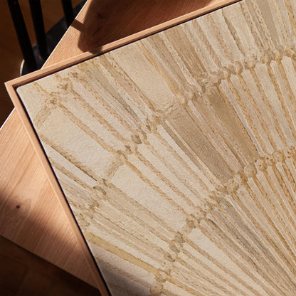 Golden fan palm leaf with radiating rays on cream, canvas print in a warm, minimally styled interior