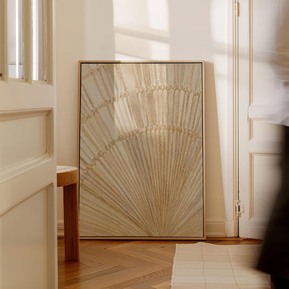 Golden fan palm leaf with radiating rays on cream, canvas print presented in a light, minimal room