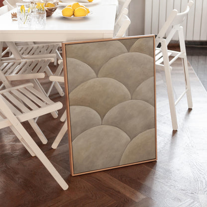 Overlapping dome scallop pattern in warm greige, canvas print displayed on a neutral wall in a styled interior