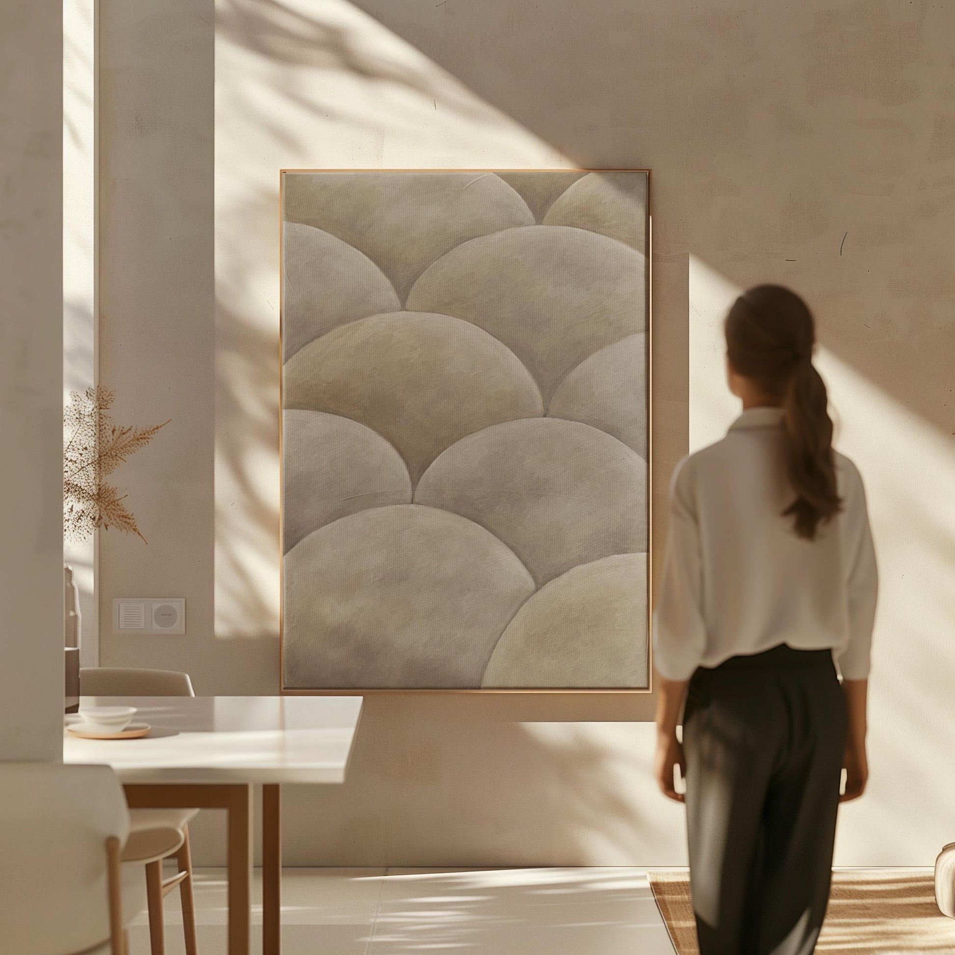 Overlapping dome scallop pattern in warm greige, canvas wall art seen in a warm interior with natural light