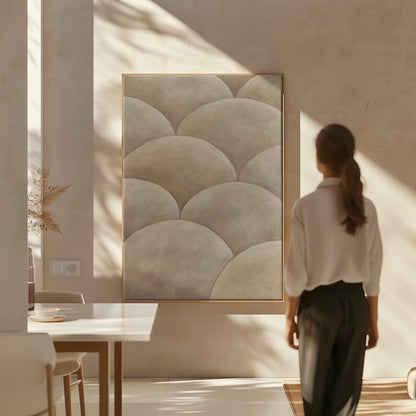 Overlapping dome scallop pattern in warm greige, canvas wall art seen in a warm interior with natural light