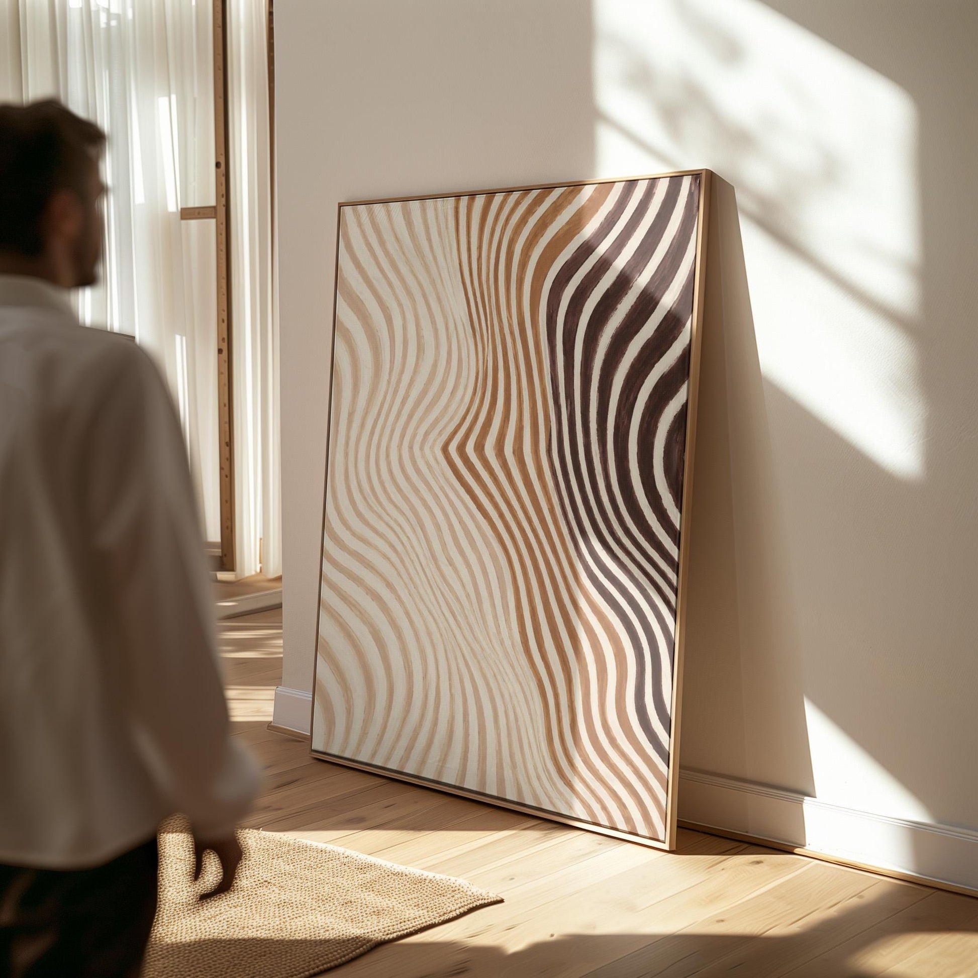 Wavy line pattern fading from beige to rust and brown, canvas print shown to scale in a furnished room