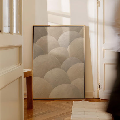 Rows of soft dome shapes in stone gray and beige, canvas print styled against a soft white wall