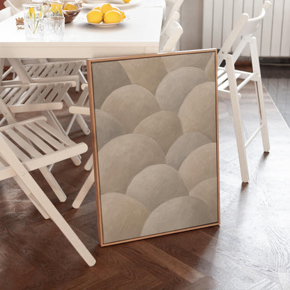 Rows of soft dome shapes in stone gray and beige, canvas wall art seen in a warm interior with natural light