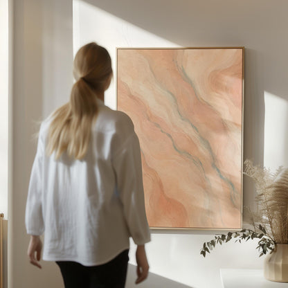 Soft flowing waves in peach blush and gray pastel, canvas wall art presented in a light, minimal room