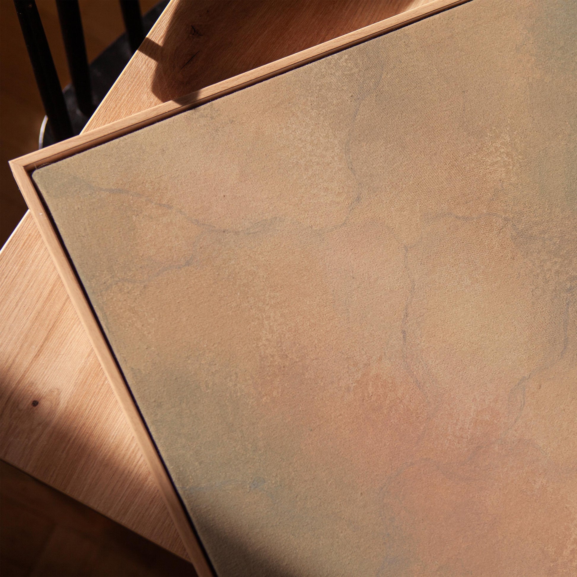 Hazy gradient blending peach and sage tones, canvas print in a warm, minimally styled interior