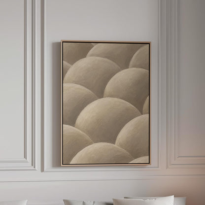 Rows of shaded dome shapes in deep taupe, canvas print in a bright room with natural daylight
