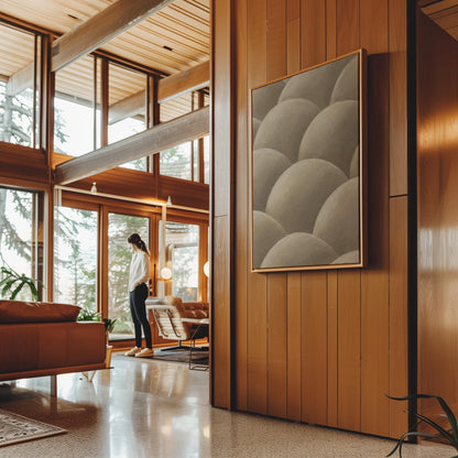 Rows of shaded dome shapes in deep taupe, canvas print presented in a light, minimal room