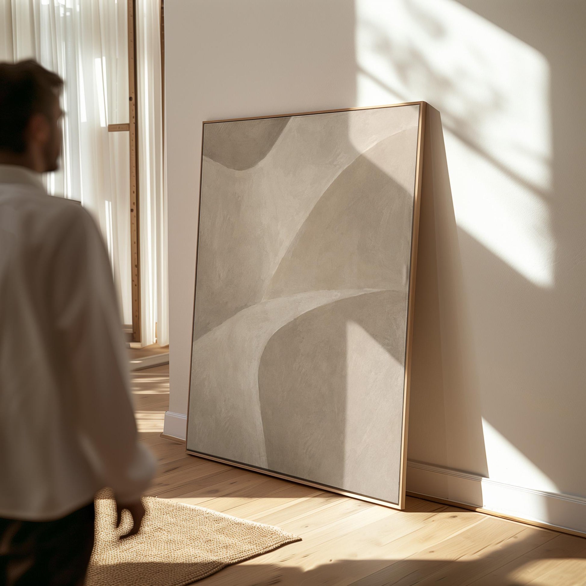 Minimal soft curved lines crossing taupe field, canvas print shown to scale in a furnished room
