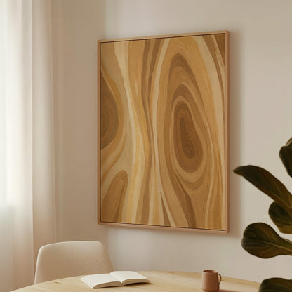 Concentric swirling lines in amber and caramel, canvas wall art seen in a warm interior with natural light