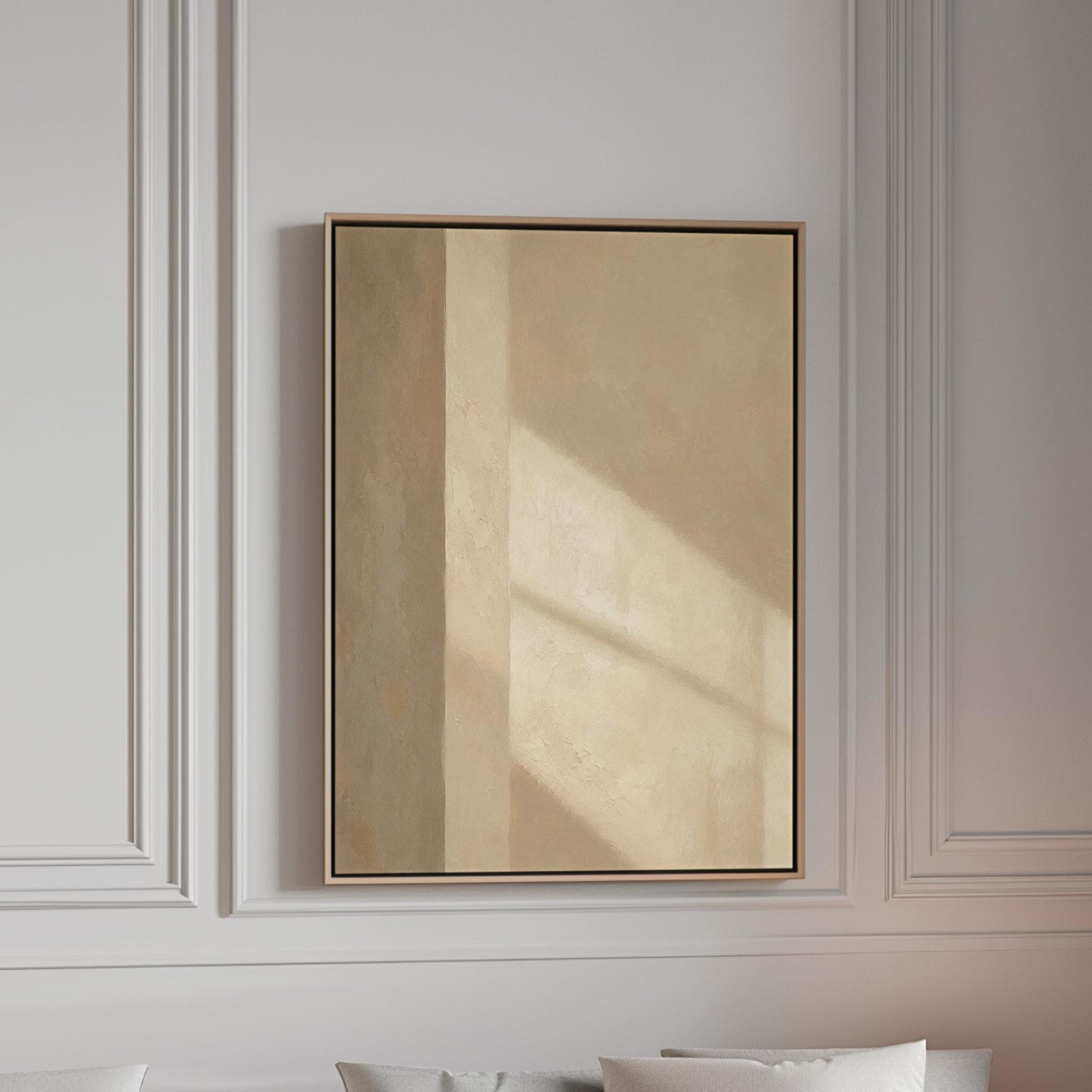 Vertical bands of light and shadow on warm beige, canvas print in a bright room with natural daylight