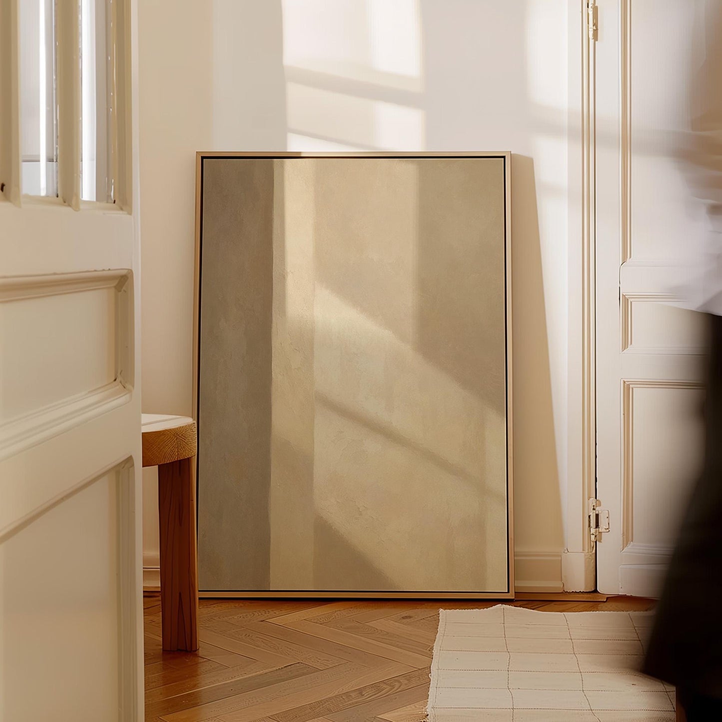 Vertical bands of light and shadow on warm beige, canvas print styled against a soft white wall