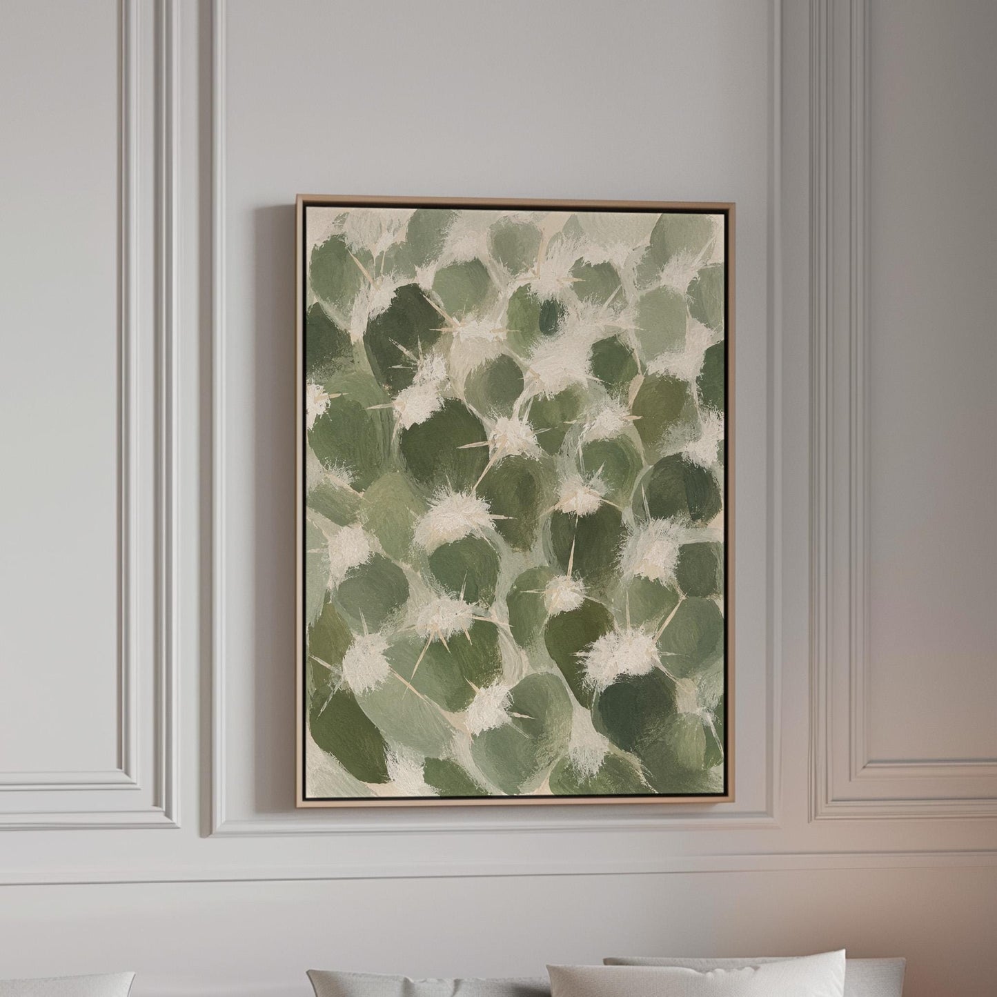 Cactus pads pattern with pale spines in sage green, canvas print in a bright room with natural daylight