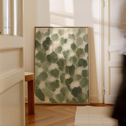 Cactus pads pattern with pale spines in sage green, canvas wall art on a quiet wall in a considered interior