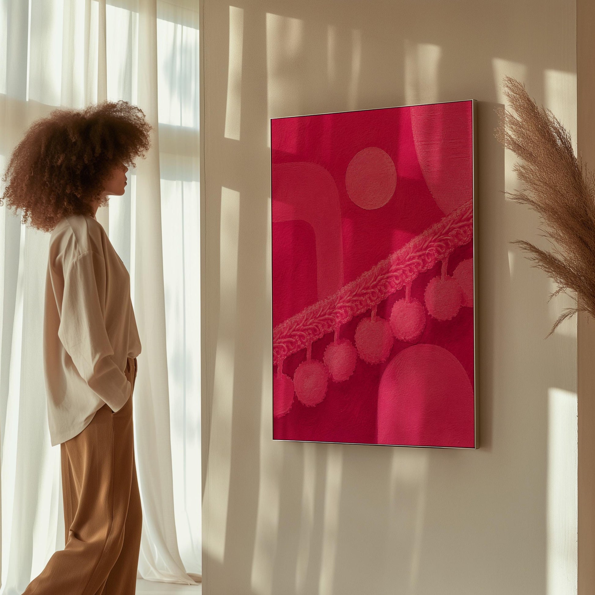 Hot magenta composition with arches and pom pom garland, canvas print presented in a light, minimal room