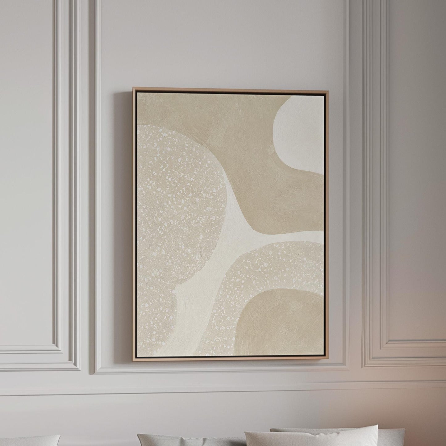Soft speckled organic shapes in pearl and cream, canvas print in a bright room with natural daylight