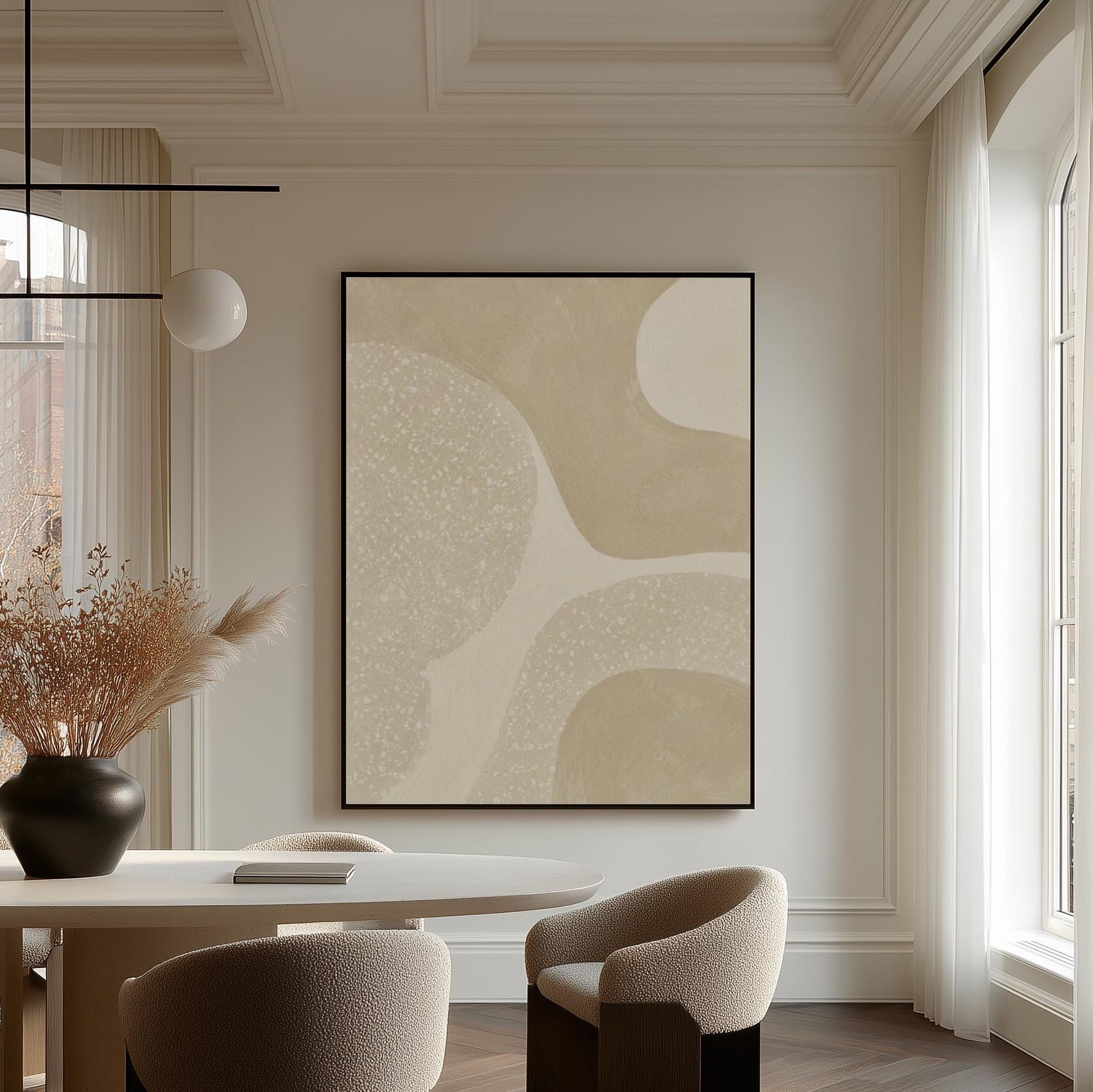 Soft speckled organic shapes in pearl and cream, canvas print hanging in a calm, modern living space